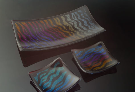 This fused glass platter and small glass dishes are an example of what you can make using glass fusing techniques.