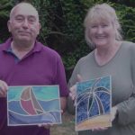 Leaded stained glass panels made on a two day course - a palm tree and a sailing boat